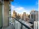 City view from balcony showcasing the buildings and urban skyline on a clear, sunny day at 891 14Th St # 3510, Denver, CO 80202