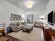 Comfortable living room with stylish decor, a cozy couch, and a well-lit atmosphere at 891 14Th St # 3510, Denver, CO 80202