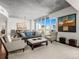 Comfortable living room with city views, modern decor, and an open-concept layout at 891 14Th St # 3510, Denver, CO 80202