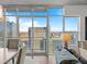Bright living room featuring floor-to-ceiling windows with city views and modern furnishings at 891 14Th St # 3510, Denver, CO 80202
