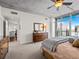 Well-lit main bedroom with a large window view, dresser, and an airy layout at 891 14Th St # 3510, Denver, CO 80202