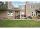 A well maintained backyard featuring a lush lawn and landscaping, perfect for outdoor activities and relaxation at 6948 Buckskin Dr, Littleton, CO 80125