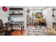 Finished basement with home office, pinball machines, and unique decor for entertainment at 6948 Buckskin Dr, Littleton, CO 80125