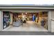 Spacious garage with ample storage, featuring high ceilings and plenty of room for vehicles and projects at 6948 Buckskin Dr, Littleton, CO 80125