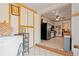 A view of the kitchen with classic finishes with adjacent dining space and a breakfast nook at 8481 E Briarwood Blvd, Centennial, CO 80112