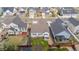 Aerial view of backyard features including a patio, pergola, and a well-kept lawn at 4422 Mt Shavano St, Brighton, CO 80601