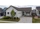 Charming single-Gathering home with a white exterior, a well-manicured lawn, and a two-car garage at 4422 Mt Shavano St, Brighton, CO 80601