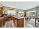 Open kitchen with breakfast bar flows to the dining area, perfect for entertaining and Gathering gatherings at 4422 Mt Shavano St, Brighton, CO 80601