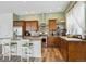 Bright kitchen featuring stainless steel appliances, wood cabinetry and breakfast bar with seating at 4422 Mt Shavano St, Brighton, CO 80601