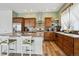Bright kitchen with stainless steel appliances, lots of storage, and breakfast bar with seating at 4422 Mt Shavano St, Brighton, CO 80601