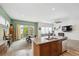 Open concept living space combining kitchen, living, and dining areas, great for gatherings and entertaining at 4422 Mt Shavano St, Brighton, CO 80601
