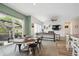 Spacious dining and living area, featuring lots of natural light with an open-concept design at 4422 Mt Shavano St, Brighton, CO 80601