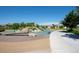 A playground featuring log balance beams, boulder, a small slide, and soft fall flooring at 4422 Mt Shavano St, Brighton, CO 80601