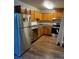 The Kitchen has stainless steel appliances and wood cabinets at 6378 S Hill St, Littleton, CO 80120