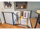 Open foyer with a view of the living area, featuring modern design and artistic wall decor at 12651 E Bates Cir, Aurora, CO 80014