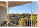 Inviting balcony with decorative railings, offering scenic views of the surrounding greenery and cityscape at 1200 N Humboldt St # 1003, Denver, CO 80218