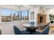 Charming breakfast nook with a table, chairs, and stunning skyline views at 1200 N Humboldt St # 1003, Denver, CO 80218