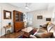 Comfortable living room with a leather couch, a wooden coffee table, and unique decor at 1200 N Humboldt St # 1003, Denver, CO 80218