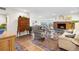 Inviting living room featuring a fireplace, comfortable seating, and scenic views from the windows at 1200 N Humboldt St # 1003, Denver, CO 80218