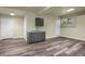 Finished basement with laminate flooring, a modern sink and countertops at 586 Alpine Way, Idaho Springs, CO 80452