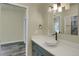 Modern bathroom featuring a stylish vanity, vessel sink, and contemporary lighting at 586 Alpine Way, Idaho Springs, CO 80452