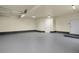 Spacious garage featuring multiple garage doors and ample space for vehicles or projects at 586 Alpine Way, Idaho Springs, CO 80452