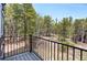 Breathtaking view from the private balcony, showcasing lush forests and natural surroundings at 586 Alpine Way, Idaho Springs, CO 80452
