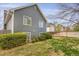 Exterior view of home showcasing the yard, offering outdoor enjoyment and privacy with green grass at 18206 E Tanforan Pl, Aurora, CO 80015