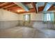 Unfinished basement with concrete floors and exposed ceiling at 18206 E Tanforan Pl, Aurora, CO 80015