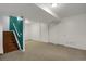 Spacious finished basement with stairs to upper level and multiple storage rooms at 18206 E Tanforan Pl, Aurora, CO 80015