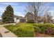 Beautiful home exterior featuring mature trees and landscaping at 18206 E Tanforan Pl, Aurora, CO 80015