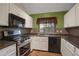 Well-lit kitchen featuring stainless steel appliances and tile backsplash at 18206 E Tanforan Pl, Aurora, CO 80015
