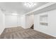 Open basement featuring neutral walls and carpet, recessed lighting, and staircase at 5651 S Himalaya Way, Centennial, CO 80015