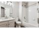 Bathroom with a tub and shower combination and a vanity sink, designed for optimal space and convenience at 5651 S Himalaya Way, Centennial, CO 80015