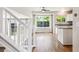 Open-concept kitchen with granite countertops and stainless steel appliances at 5651 S Himalaya Way, Centennial, CO 80015