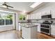 Updated kitchen featuring granite countertops, hardwood floors and stainless appliances at 5651 S Himalaya Way, Centennial, CO 80015