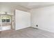 Bright living room with carpet and large windows that let in natural light at 5651 S Himalaya Way, Centennial, CO 80015