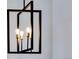 Modern geometric light fixture with four lights at 14408 Hop Clover Trl, Parker, CO 80134