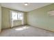 Inviting bedroom bathed in natural light, featuring neutral walls, and trim at 14825 Almstead St, Hudson, CO 80642