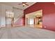 Open-concept living room with high ceilings and hardwood floors at 14825 Almstead St, Hudson, CO 80642