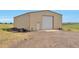 Large detached garage with ample space for storage and projects at 14825 Almstead St, Hudson, CO 80642