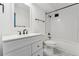 Updated bathroom features subway tile and patterned flooring around a toilet and vanity at 7020 E Girard Ave # 209, Denver, CO 80224