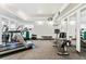 Exercise equipment like treadmill, bicycle and free weights located in a well-lit gym area at 7020 E Girard Ave # 209, Denver, CO 80224