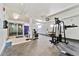 Well-equipped gym with weight machines, free weights, and separate shower/locker area at 7020 E Girard Ave # 209, Denver, CO 80224