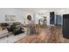 Living room featuring stylish furnishings, wood floors, and contemporary decor at 7020 E Girard Ave # 209, Denver, CO 80224