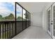 This outdoor patio has large windows offering light and views at 7020 E Girard Ave # 209, Denver, CO 80224