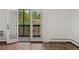 This patio boasts an open glass and screen door and a treelined view at 7020 E Girard Ave # 209, Denver, CO 80224