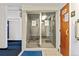 Shower area with private stall, access to a changing area, and available to residents and guests at 7020 E Girard Ave # 209, Denver, CO 80224
