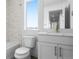 Well-lit bathroom with tub and shower combination, toilet, and single sink vanity at 14261 Currant St, Broomfield, CO 80020