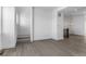 Spacious living area features stairs and a modern chandelier lighting the adjacent dining area at 14261 Currant St, Broomfield, CO 80020